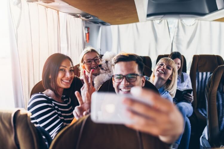 Bus trip selfie with friends.