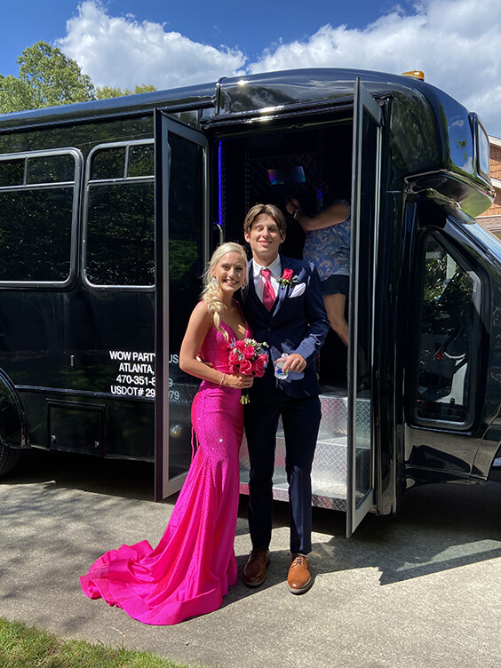 Couple at prom with limo