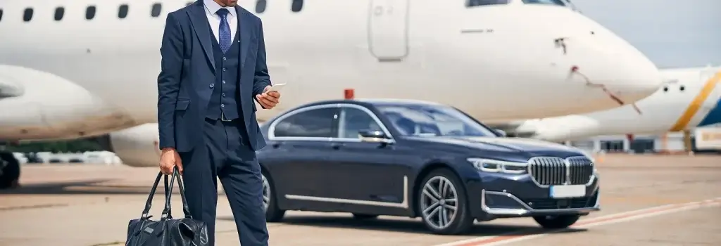 Businessman phone airport car travel.