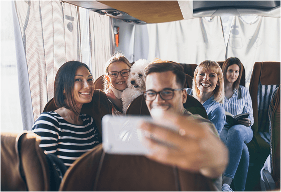 Happy family bus selfie, dog included.